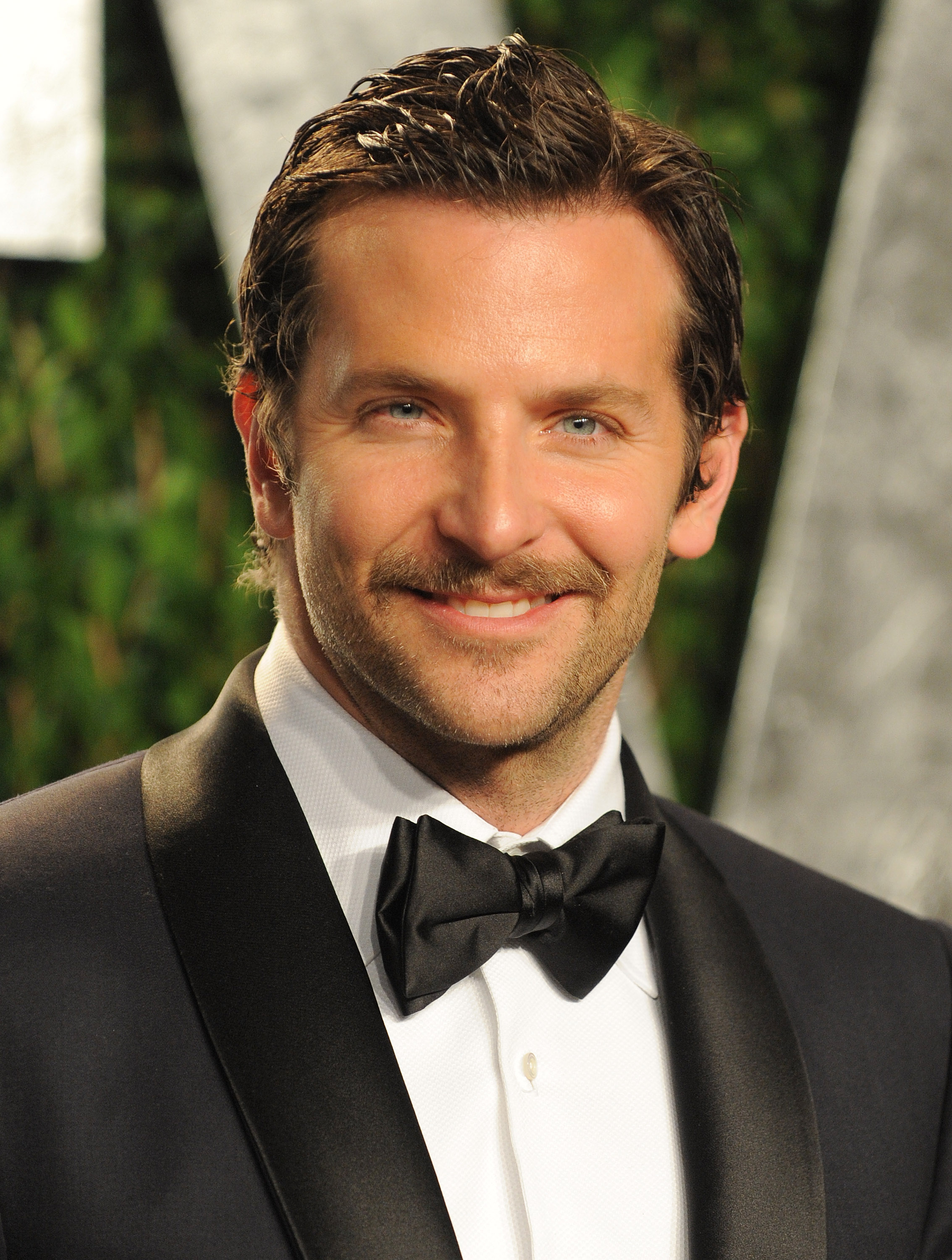 Bradley Cooper brings his mustache to the Vanity Fair party.