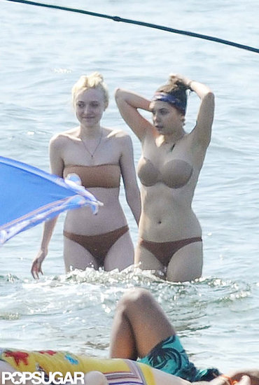Dakota Fanning and Elizabeth Olsen showed off their bikini bodies. Dakota Fanning and Elizabeth Olsen showed off their bikini bodies.