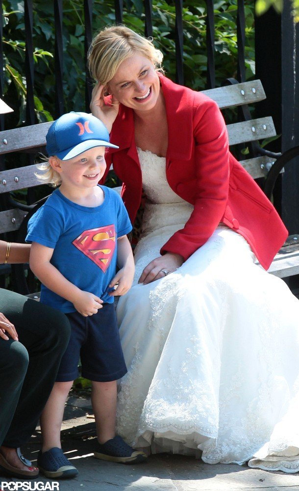 Archie Arnett Wore A Superman Shirt. | Amy Poehler Gets Close With Pal