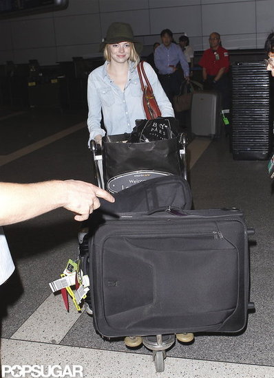 Emma Stone Packs Up Fashion Week Fun and Heads Home Emma Stone Packs Up Fashion Week Fun and Heads Home