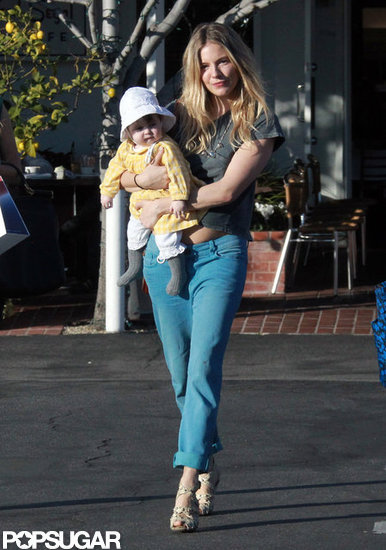 Sienna Miller carried Marlowe after lunch. Sienna Miller carried Marlowe after lunch.