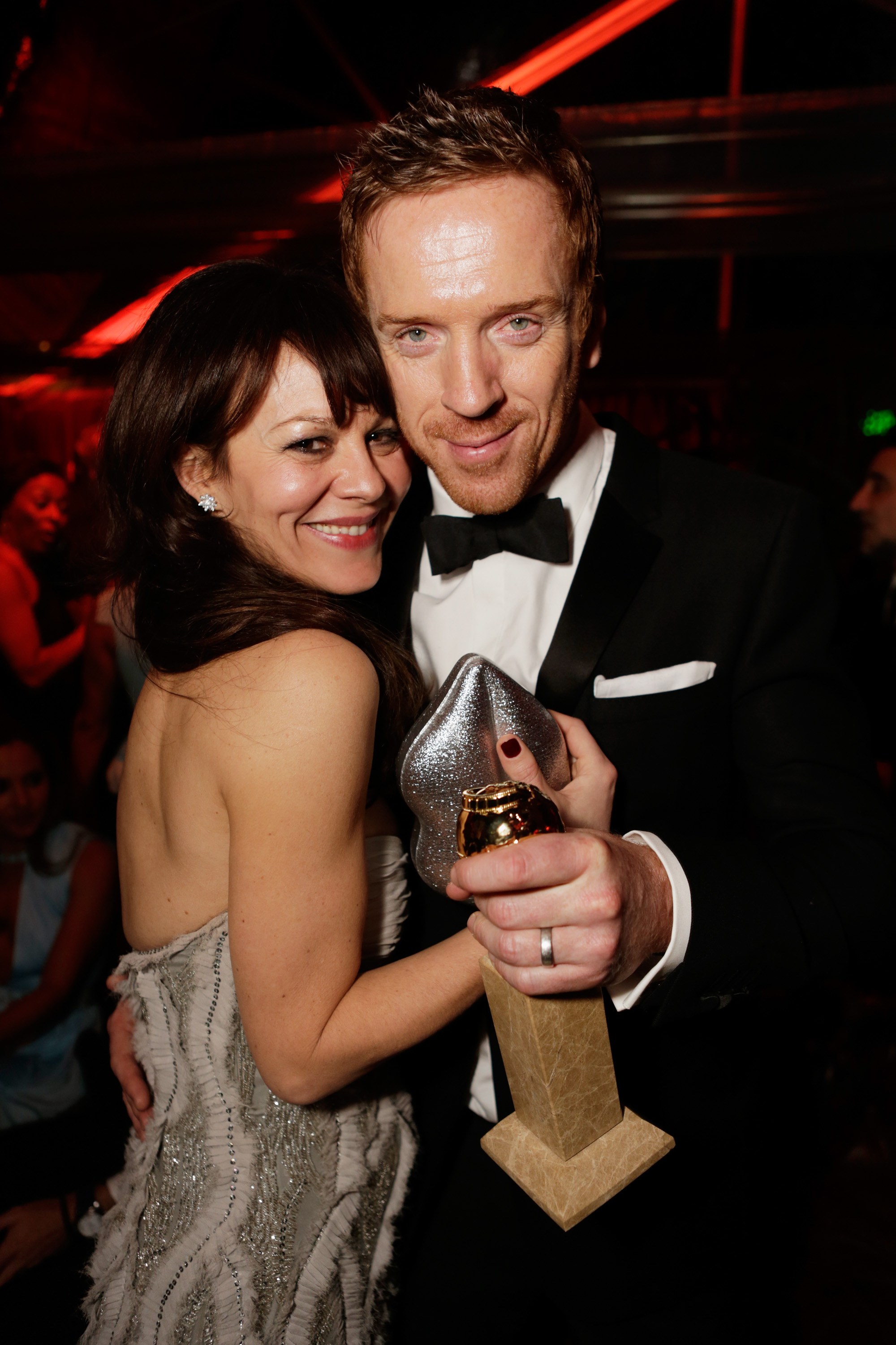 Best actor winner Damian Lewis and his wife, Helen McCrory, danced at ... photo