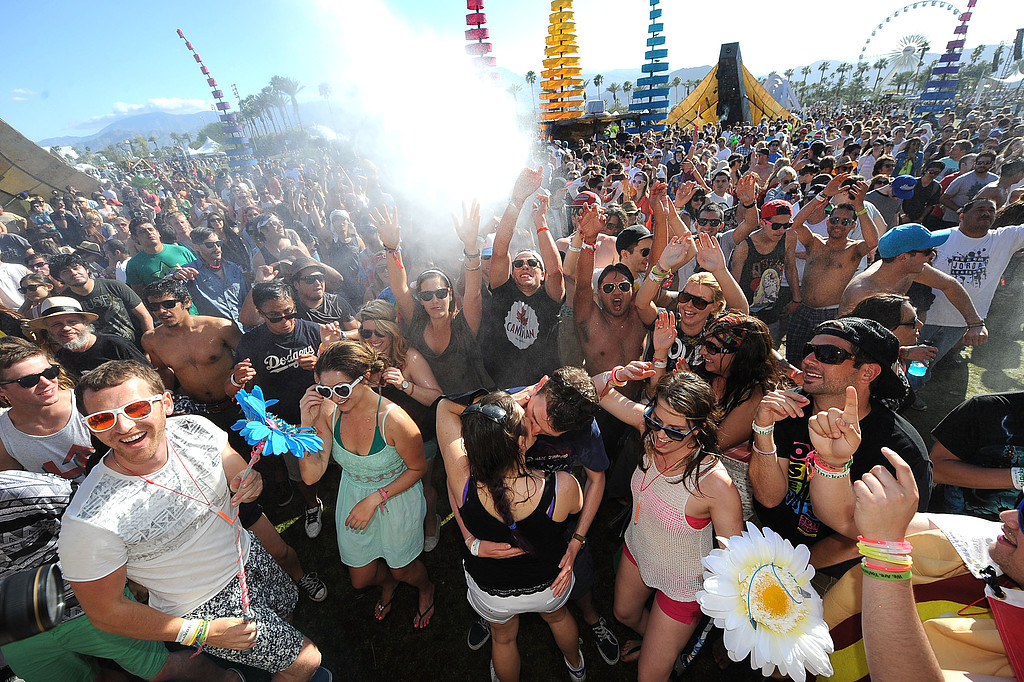 A couple kissed at Coachella.
A couple kissed at Coachella.