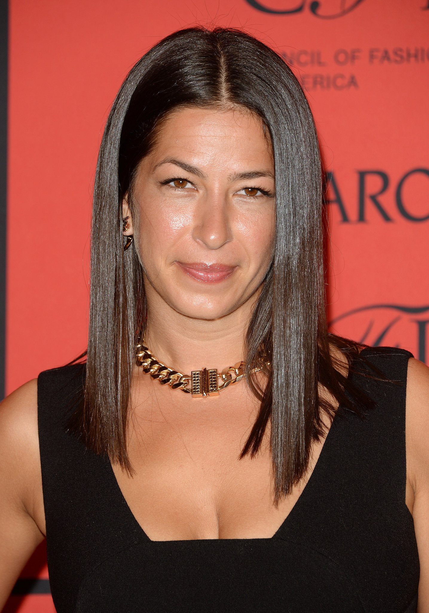 Designer Rebecca Minkoff opted for straight, shiny strands and a bronzed-glow beauty look - Designer-Rebecca-Minkoff-opted-straight-shiny-strands