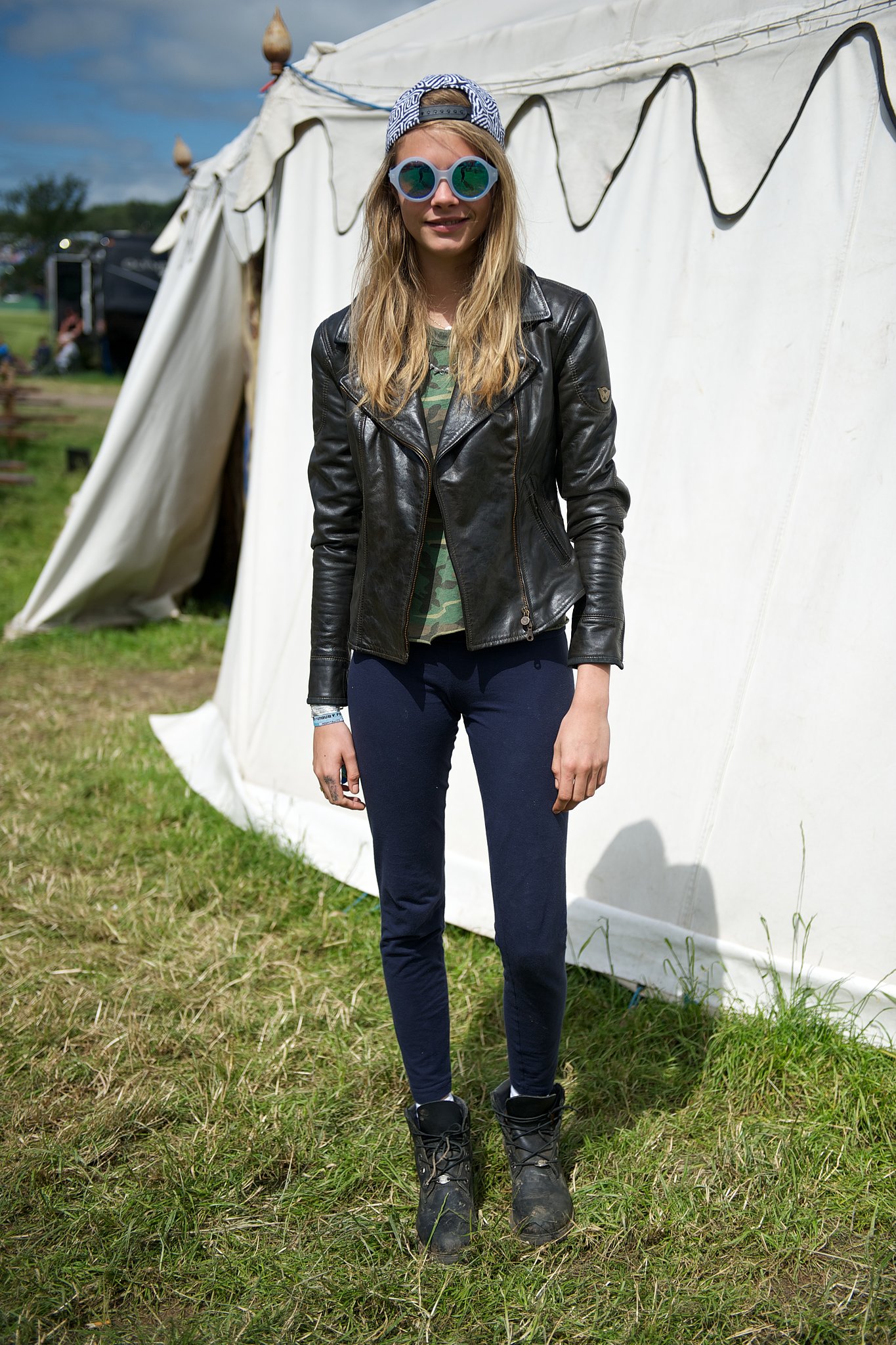 Cara Delevingne Sported A Backwards Baseball Cap With Funky Round Wellies Required See