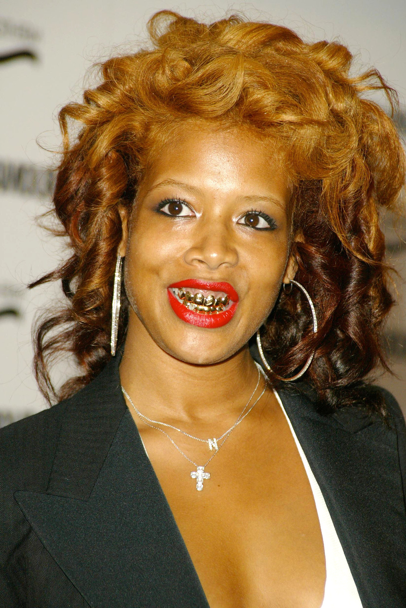 Kelis is a grill pioneer, having first worn them back in 2004. | Famous .