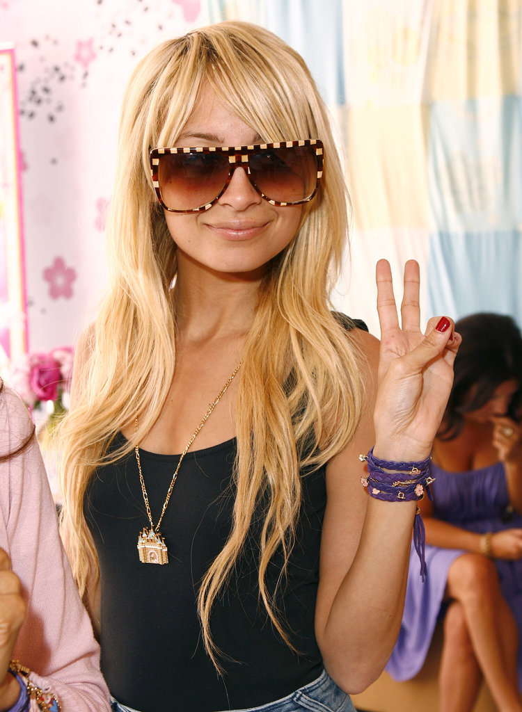 She flashed a peace sign at a Disney Couture party hosted by her longtime friend Kidada Jones in May 2007.
She flashed a peace sign at a Disney Couture party hosted by her longtime friend Kidada Jones in May 2007.