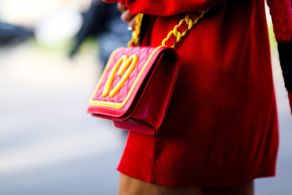 Anna Dello Russo was lovin' it — her Moschino crossbody bag, that is.
Anna Dello Russo was lovin' it — her Moschino crossbody bag, that is.