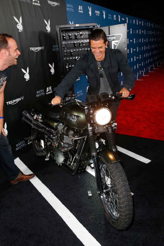 Orlando Bloom lit up while checking out a motorcycle on the red carpet at Playboy and A&E's Bates Motel event on Friday.
Orlando Bloom lit up while checking out a motorcycle on the red carpet at Playboy and A&E's Bates Motel event on Friday.