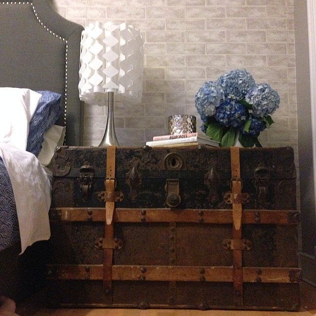It doesn't have to be a nightstand to serve the purpose of a bedside table. Vintage pieces (like this steamer trunk) can be beautiful substitutes for traditional bedroom furniture.
It doesn't have to be a nightstand to serve the purpose of a bedside table. Vintage pieces (like this steamer trunk) can be beautiful substitutes for traditional bedroom furniture.