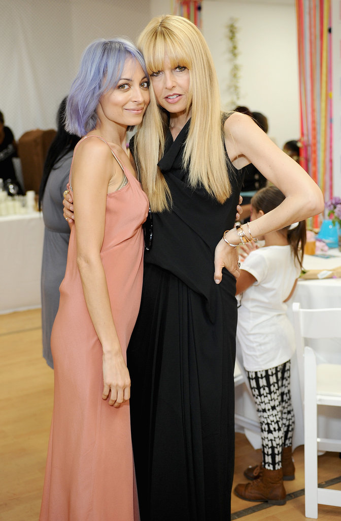 A purple-haired Nicole reunited with Rachel Zoe at the Baby2Baby Mother's Day bash in April 2014.
A purple-haired Nicole reunited with Rachel Zoe at the Baby2Baby Mother's Day bash in April 2014.