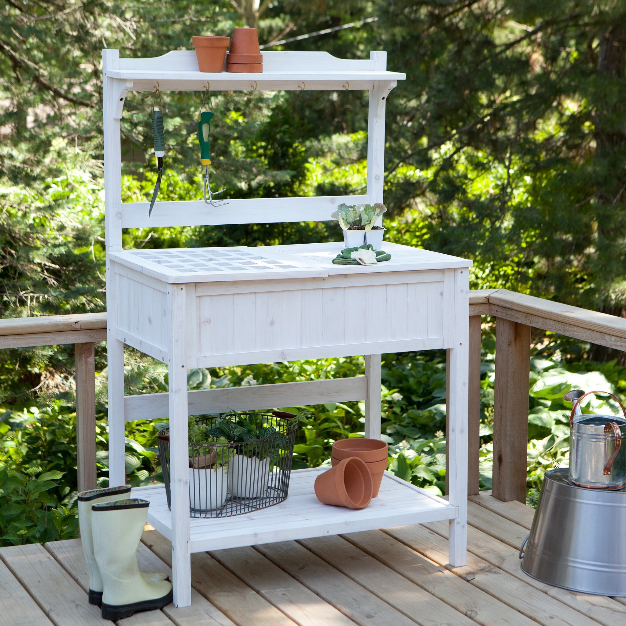 This whitewashed potting bench (170) is full of traditional charm