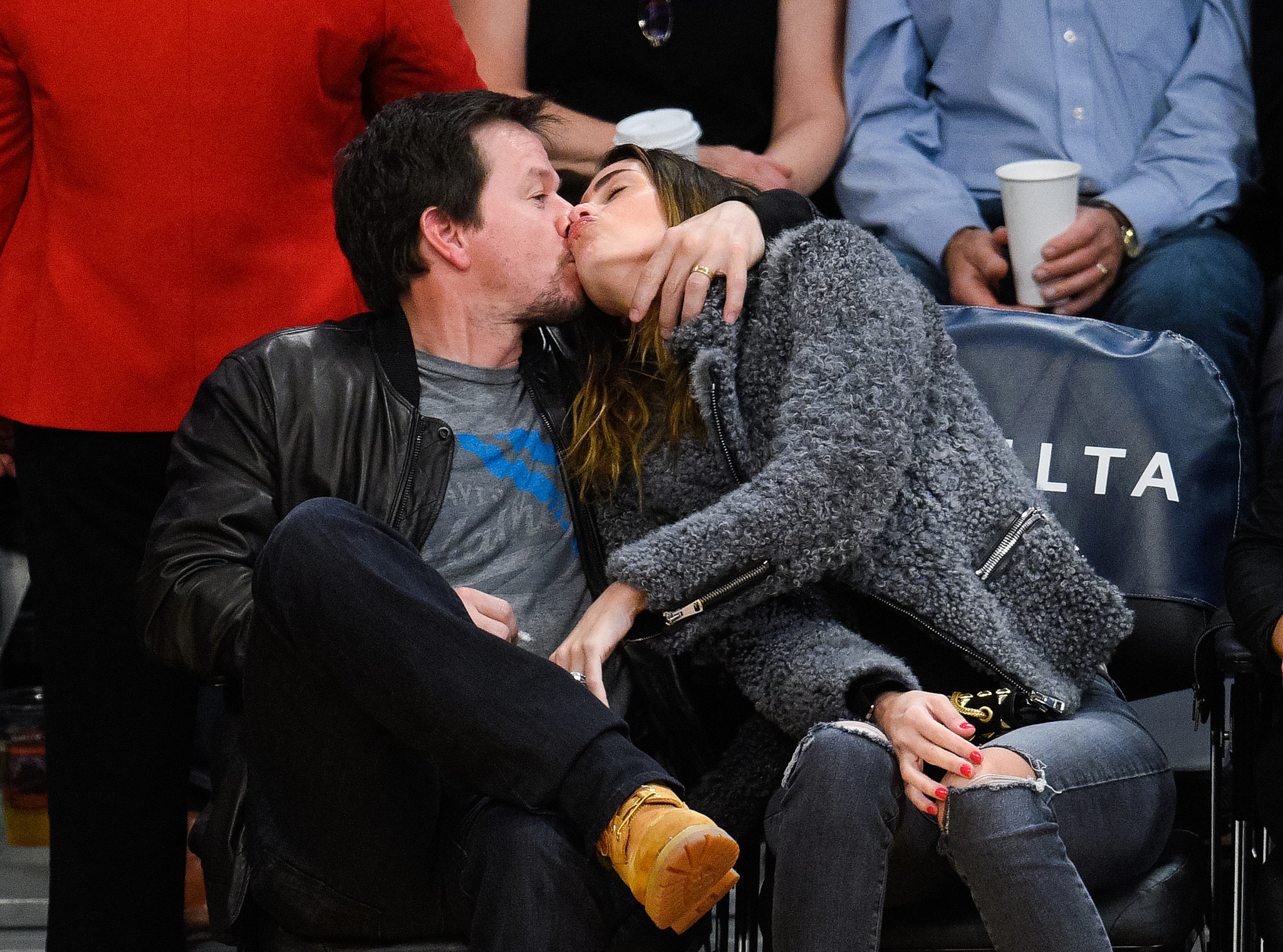 Mark Wahlberg and Rhea Durham shared a passionate kiss while sitting