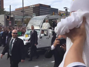 Pope Francis Catches the Giggles After Meeting a Baby Pope During Parade in Philly