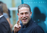 Charlie Hunnam Graces Carpet With