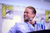 Charlie Hunnam Brings ***y Smirk