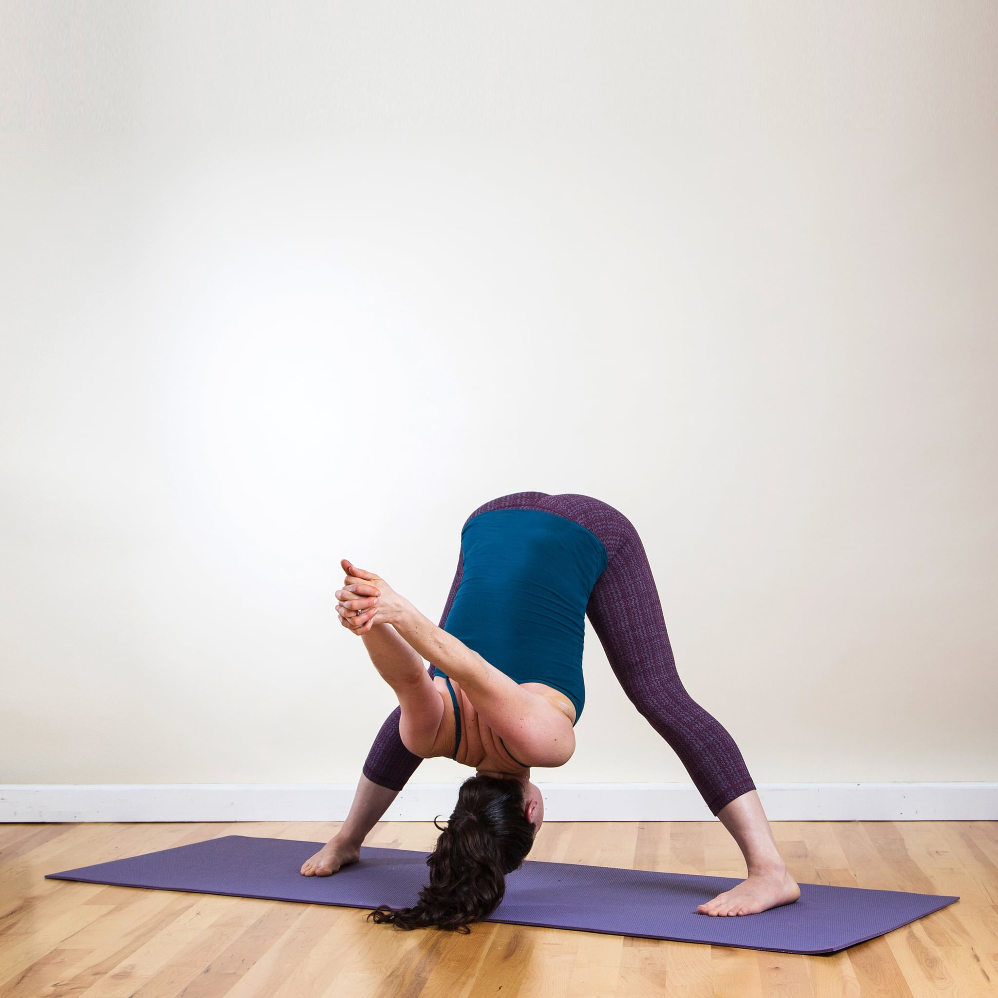Wide Legged Forward Bend Pose Energize Your Body And Brain With This