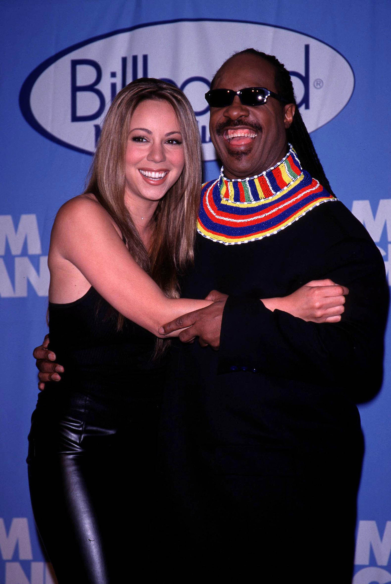 Mariah Carey and Stevie Wonder posed for a pic at the December 1998 ...