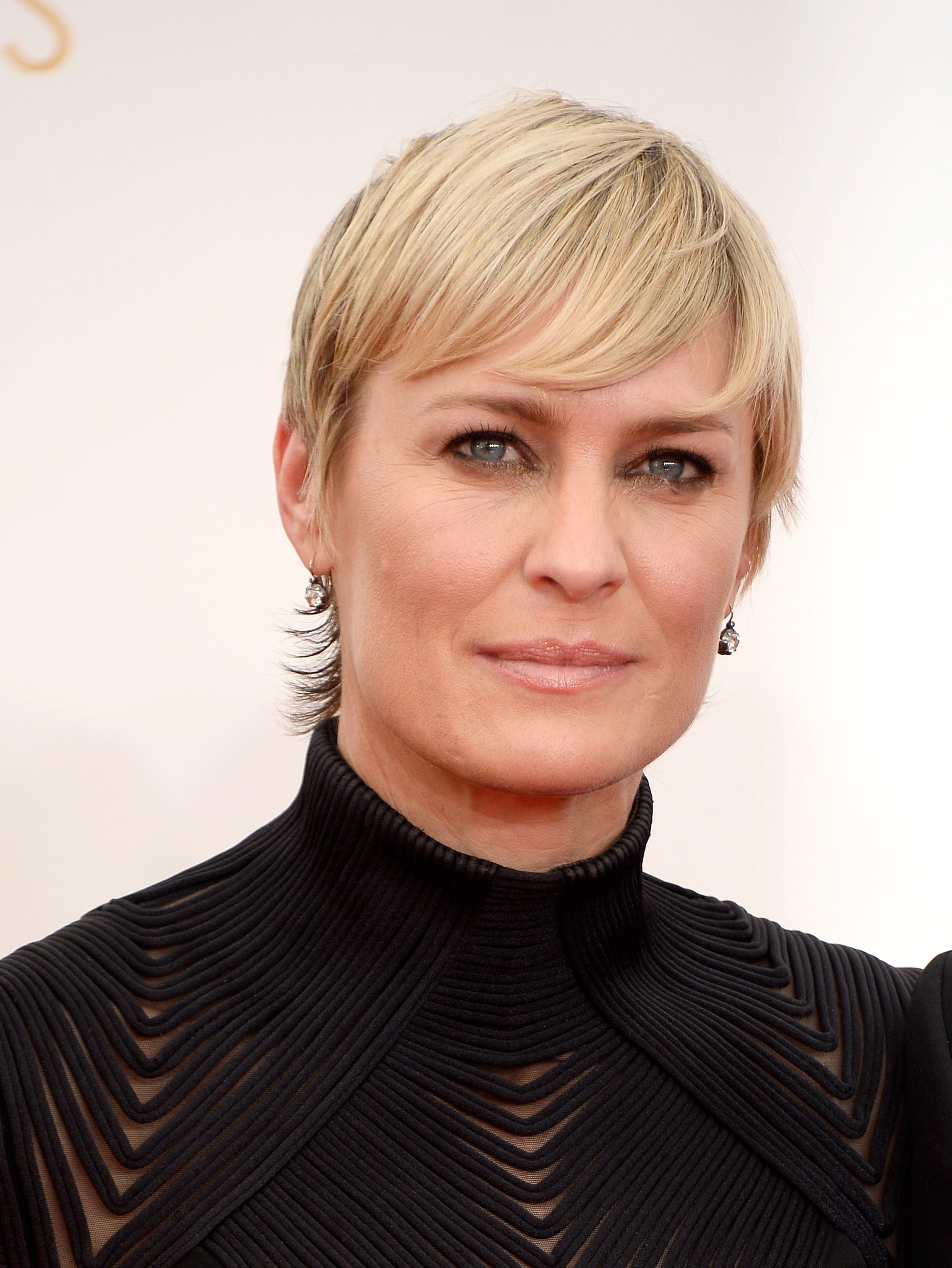 Robin Wright styled her pixie in a sleek look, finishing her Emmys ...