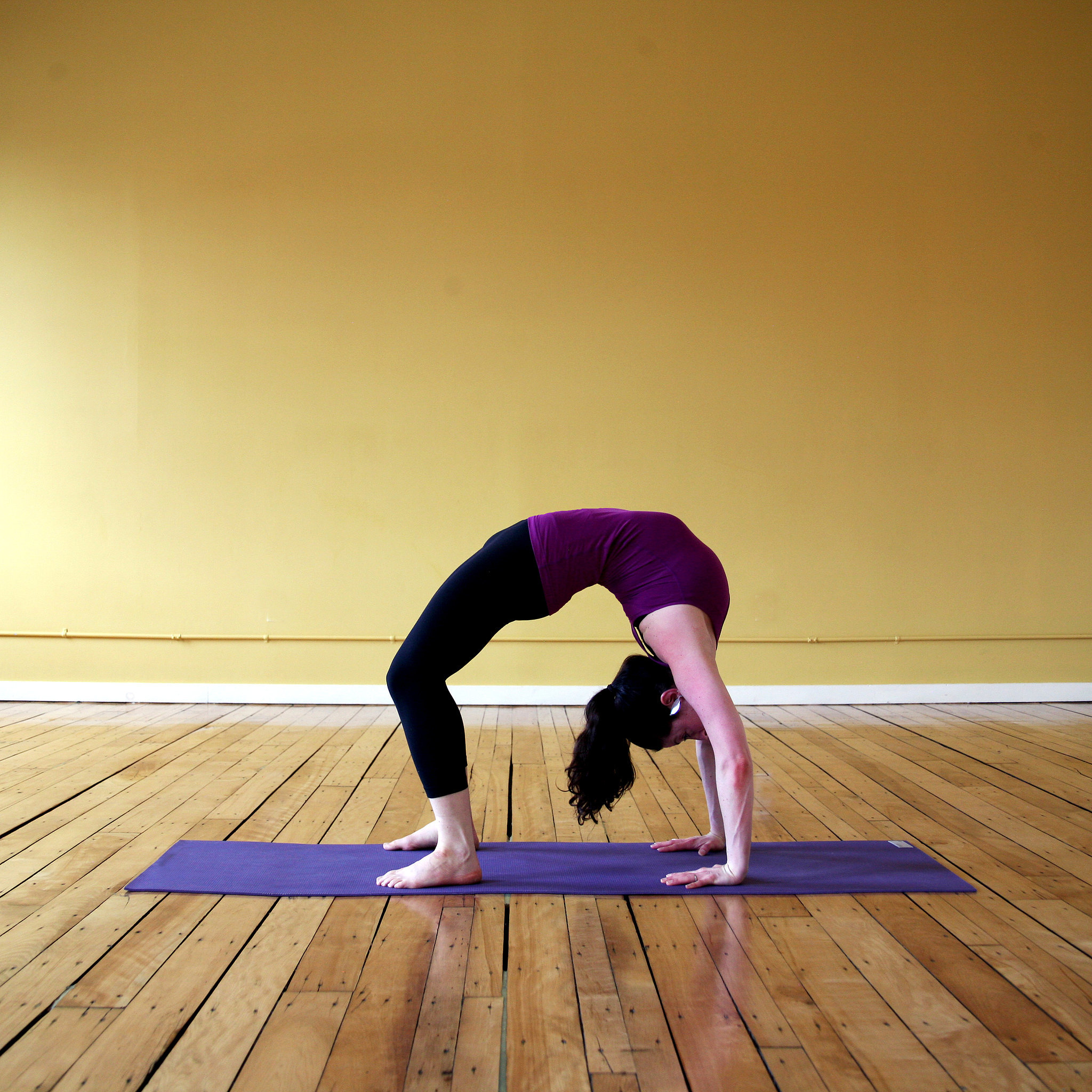 The Yoga Pose Wheel aka Backbend Explained | POPSUGAR Fitness