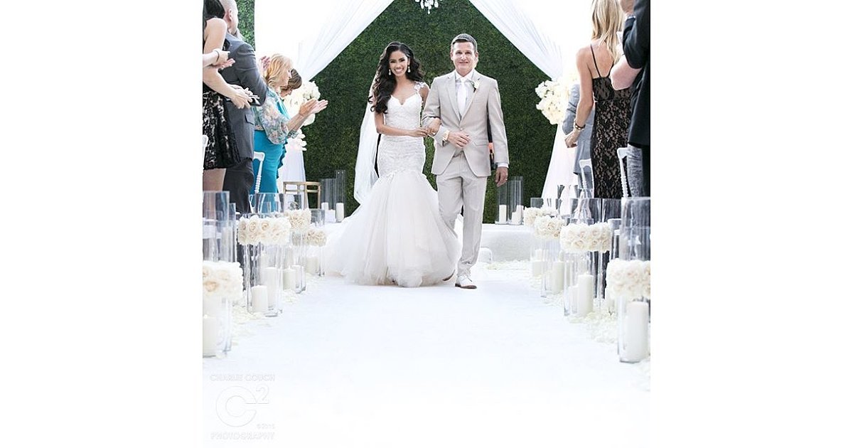 The couple walked up the aisle after becoming husband and wife. | See ...