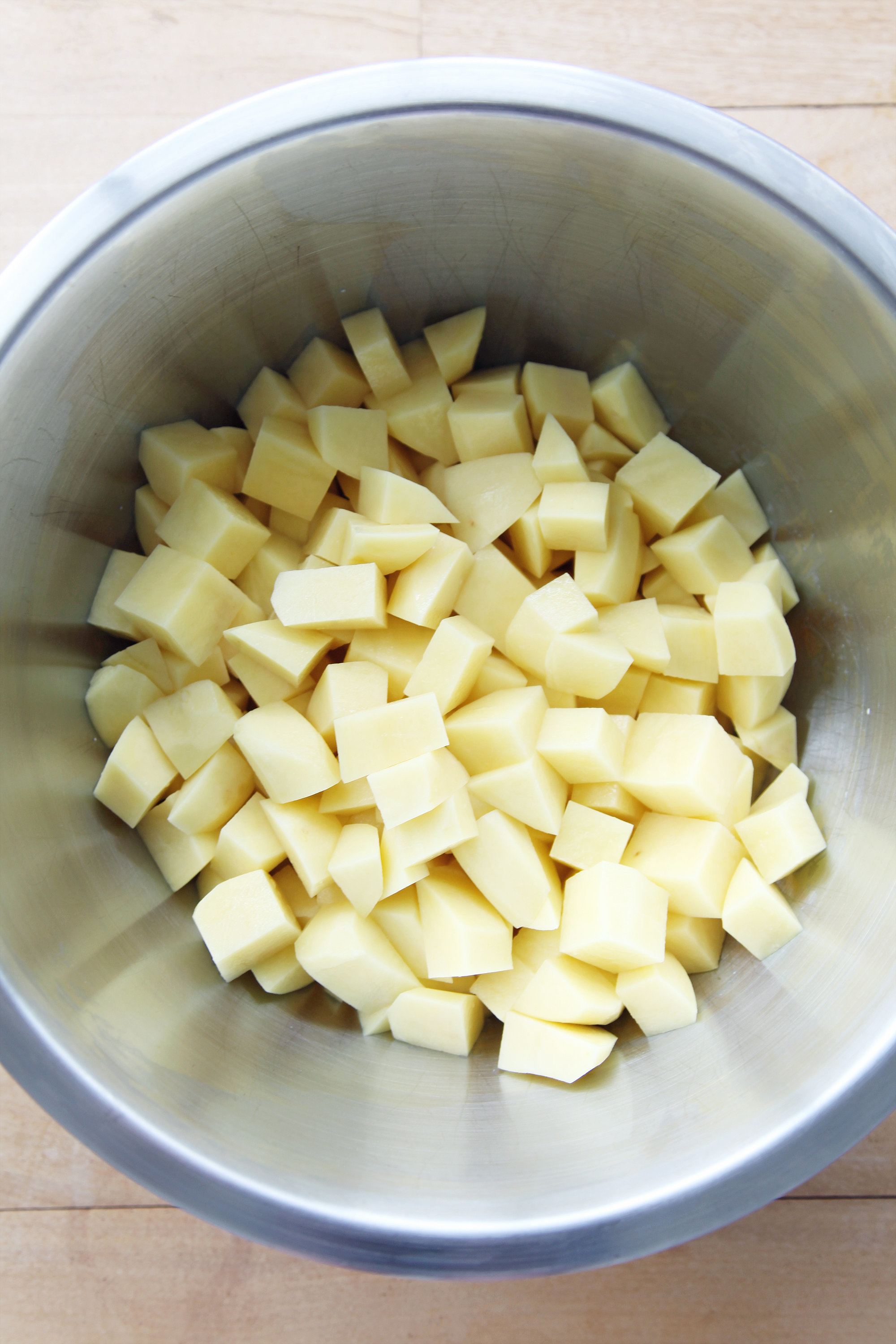 Ina Garten's mashed potatoes recipe for Thanksgiving: chopping the potatoes