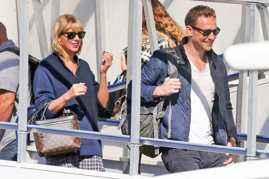 Tom Hiddleston dan Taylor Swift saat mendarat di Australia.